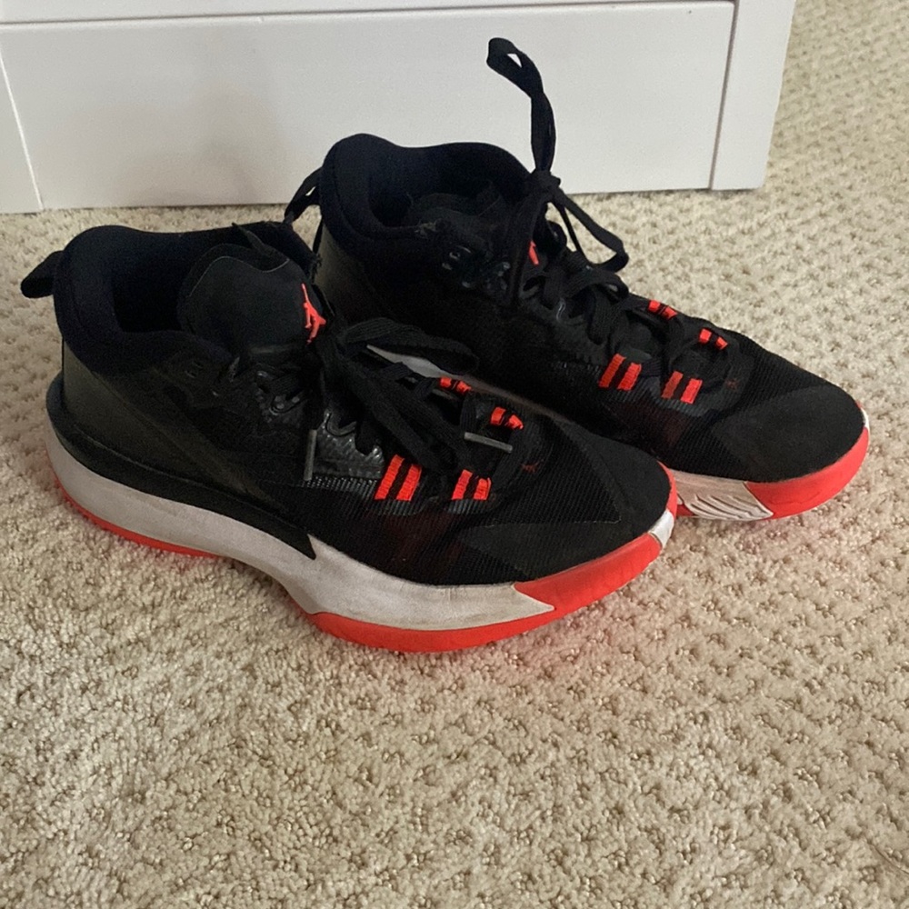 Nike Jordan Zion 1 black and orange shoes.  Size 6.5.